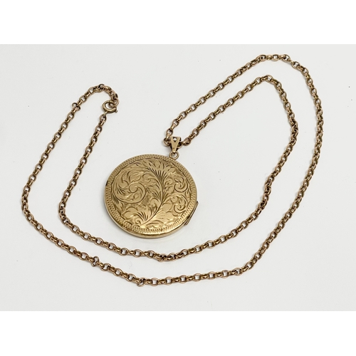 138 - A 9ct gold chain and locket. 32.26 grams.