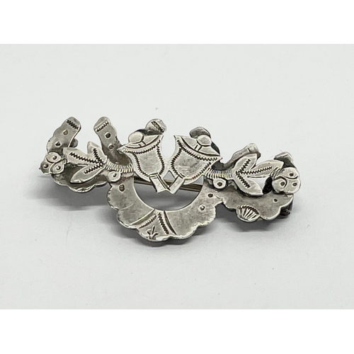 146 - An early 20th century silver brooch. 1902, Chester. 2.16 grams.