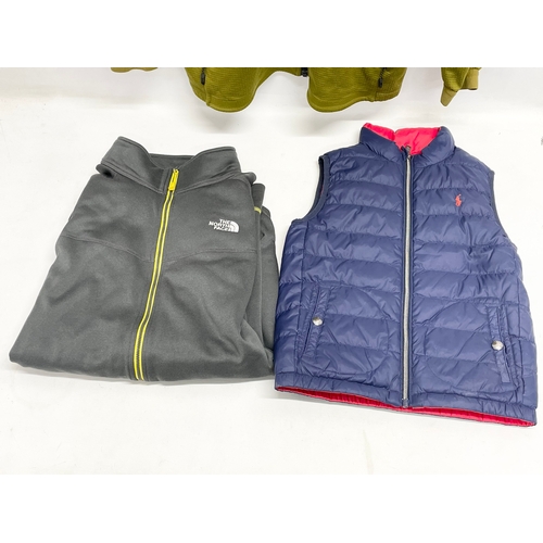 151 - 2 North Face jackets and a child’s Ralph Lauren gilet.