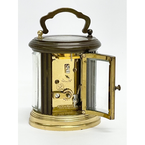 96 - A small vintage French brass carriage clock. Angelus. 7x8cm