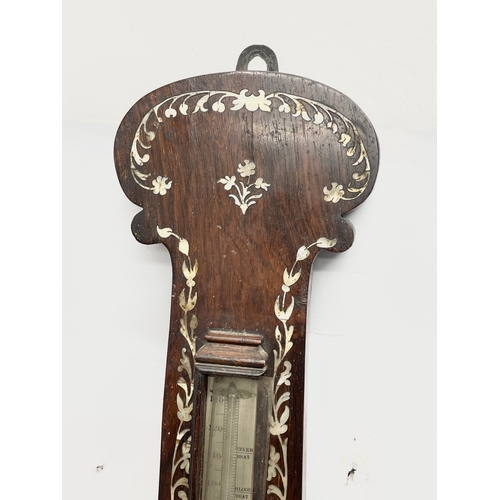 43 - A William IV rosewood barometer with Mother of Pearl inlaid. By G. Fillinger. Circa 1830. 32.5x103.5... 