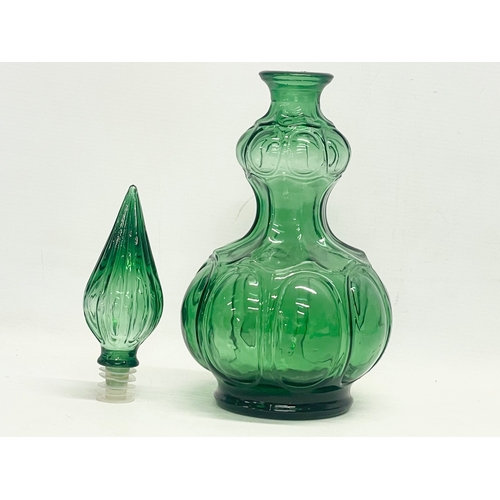 97 - A 1960’s Mid Century Italian Empoli Glass Genie decanter. 35.5cm.