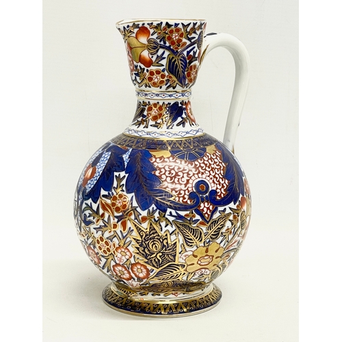 98 - A vintage ‘Imari’ pattern jug. With makers stamp. 15x22cm