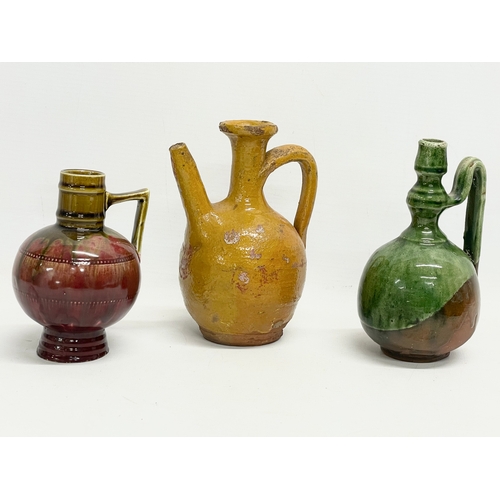 254 - A collection of vintage glazed stoneware pottery.