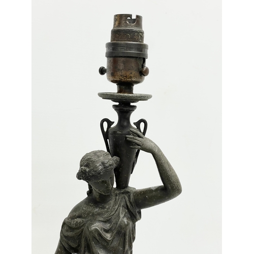 257 - An early 20th century classical style spelter figurine table lamp. 46cm