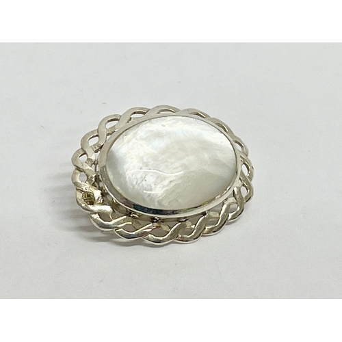 167 - A silver and Mother of Pearl brooch.