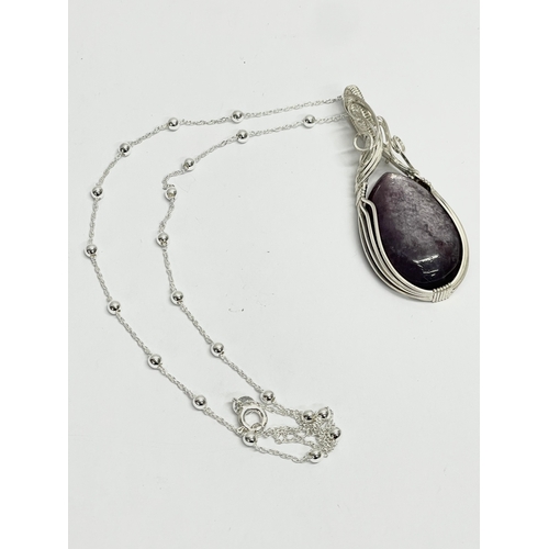 168 - A large sterling silver necklace.