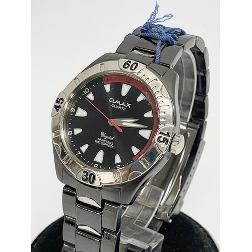 175 - An Omax Crystal 50 Meters Waterproof watch.