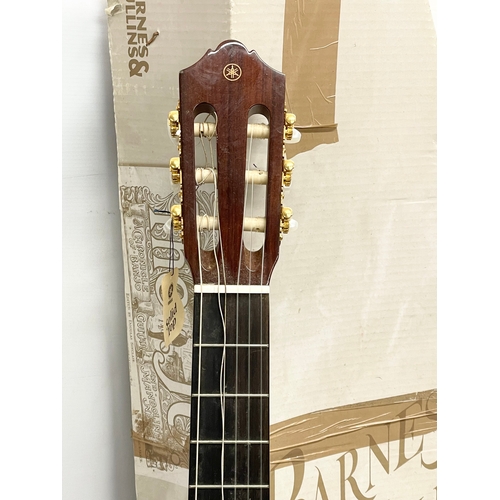 103 - A Yamaha CG162C acoustic guitar, from Barnes & Mullins, London.