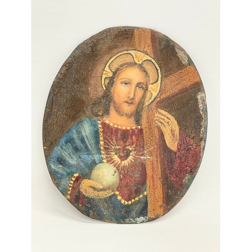 51 - A late 18th/19th century oil painting of Jesus on tin. 10x12cm