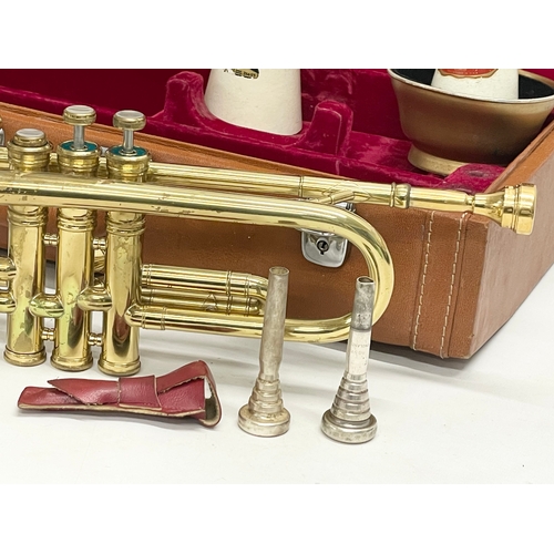 279 - A brass trumpet in case. Case measures 53x25x13cm