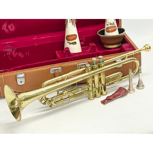 279 - A brass trumpet in case. Case measures 53x25x13cm