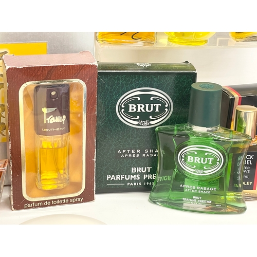 186 - A collection of perfumes and aftershaves