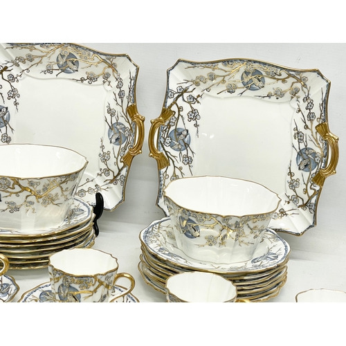 57 - A 42 piece excellent quality rare late 19th century Wedgwood fine porcelain coffee set, with hand pa... 