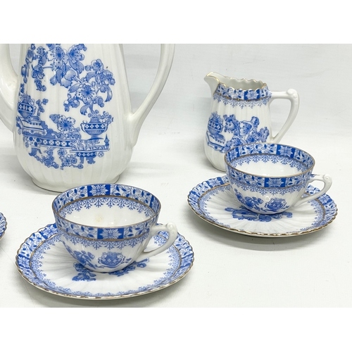 302 - An 11 piece early 20th century fine porcelain ‘China Blau Rosslau’ coffee set by H. Schomberg & Sons... 