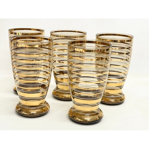 303 - Vintage drinks set. A 6 piece 1970’s gilt smoked glass lemonade drinks set, pitcher measures 17x26cm... 