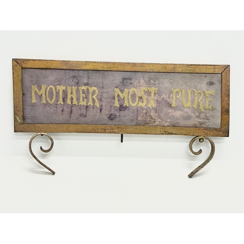 111 - An early 20th century double sided brass framed religious embroidery. Mother Most Pure. 41.5x22cm.