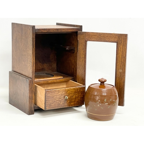 60 - An Edwardian oak humidor smokers pipe cabinet. 21x15.5x28cm