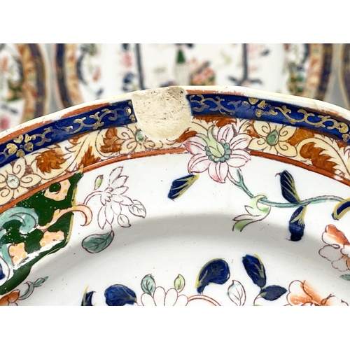 313 - A collection of 19th century Ashworth Real Ironstone China dinnerware. Circa 1862-1890. 6 dinner pla... 