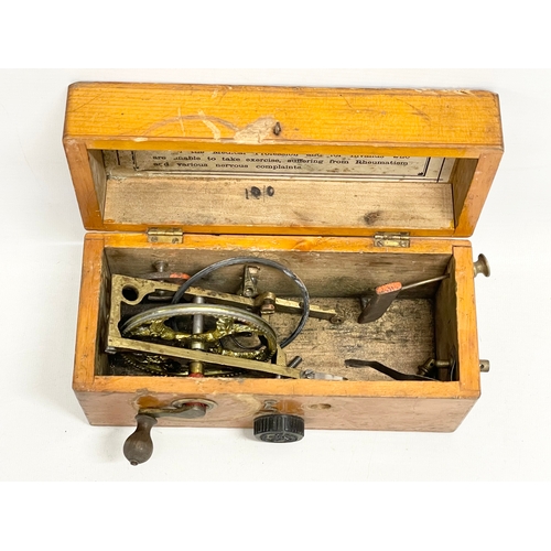 117 - A late 19th century Medical Magneto Electric Machine. 22x10x11cm