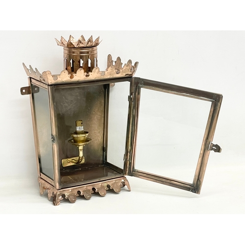 298 - A 19th century style copper wall mounted lantern. 24x13x37.5cm