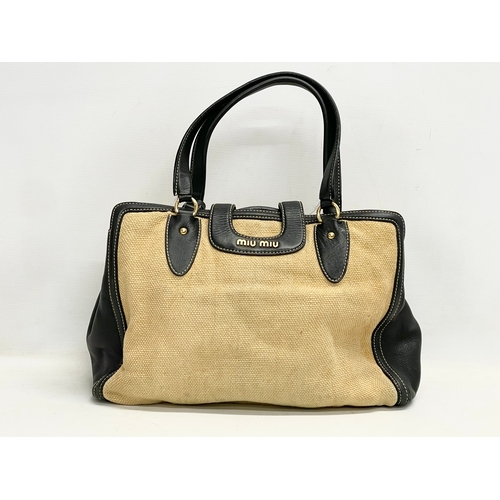 188 - A ladies Miu Miu handbag. 40x30cm