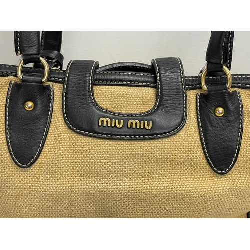 188 - A ladies Miu Miu handbag. 40x30cm