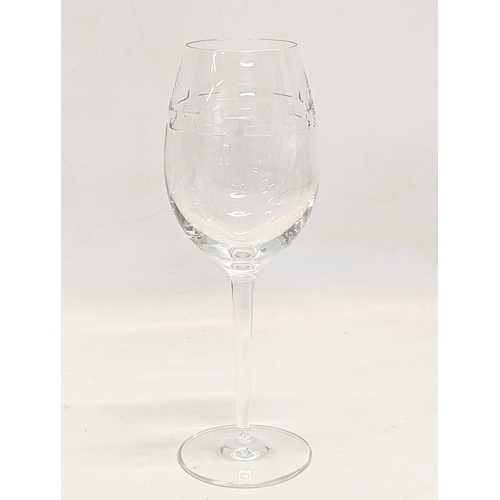 330 - A set of 8 Waterford John Rocha Crystal wine glasses. 24cm