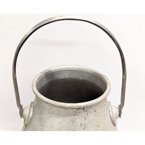 335 - A vintage milk pail. 55cm