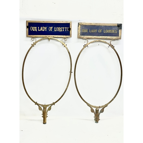 121 - A pair of large early 20th century double sided brass framed. With religious embroidery panels. Our ... 