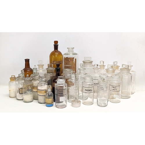 62 - A collection of late 19th / early 20th century chemist bottles. 29 in total.