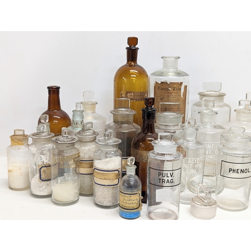 62 - A collection of late 19th / early 20th century chemist bottles. 29 in total.