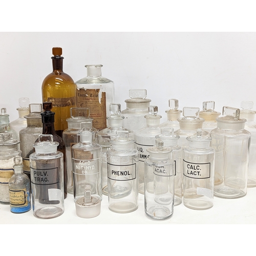 62 - A collection of late 19th / early 20th century chemist bottles. 29 in total.