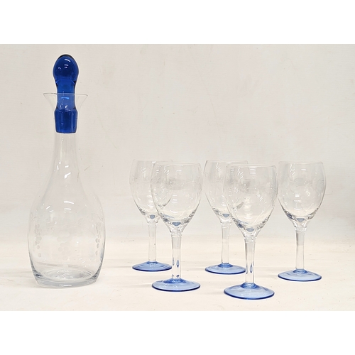 351 - A 12 piece etched glass drinks set. Decanter measures 29cm.