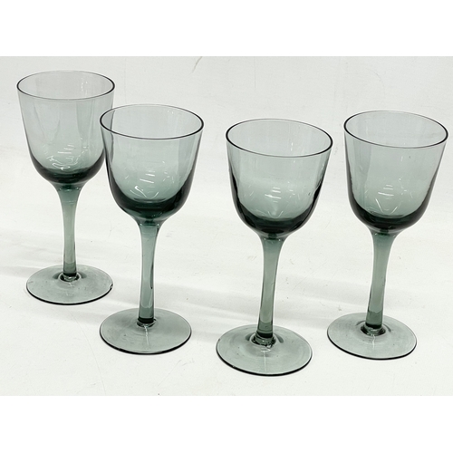 322 - A set of 4 early 20th century wine glasses. 16cm