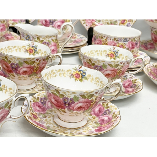 63 - A 39 piece Royal Albert ‘Serena’ tea service. 2 milk jugs. 2 sugar bowls. 12 sandwich plates. 11 sau... 