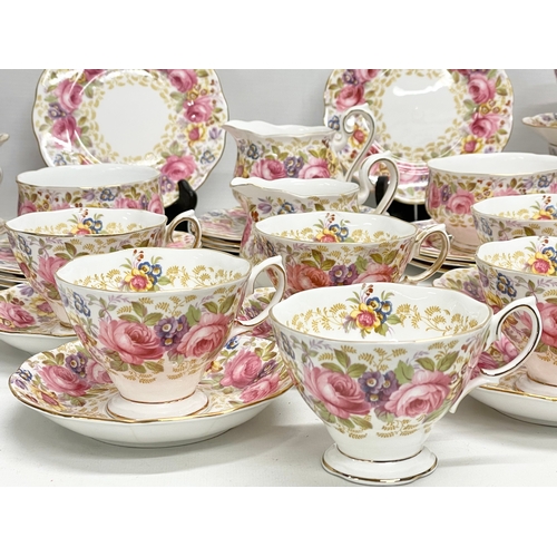 63 - A 39 piece Royal Albert ‘Serena’ tea service. 2 milk jugs. 2 sugar bowls. 12 sandwich plates. 11 sau... 