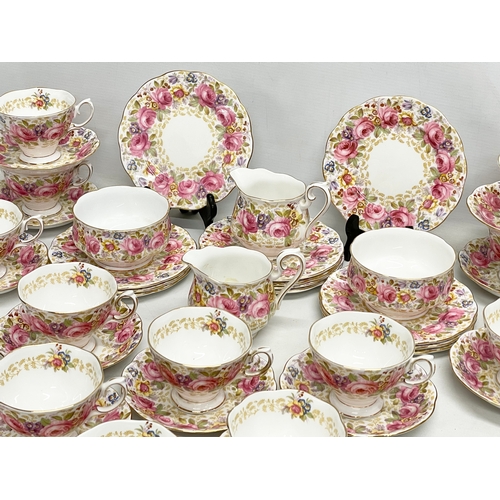 63 - A 39 piece Royal Albert ‘Serena’ tea service. 2 milk jugs. 2 sugar bowls. 12 sandwich plates. 11 sau... 