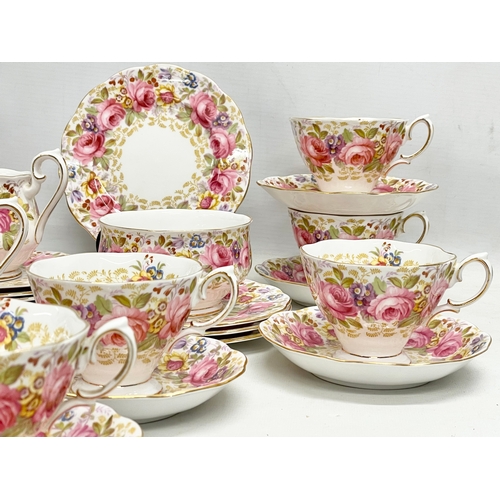 63 - A 39 piece Royal Albert ‘Serena’ tea service. 2 milk jugs. 2 sugar bowls. 12 sandwich plates. 11 sau... 