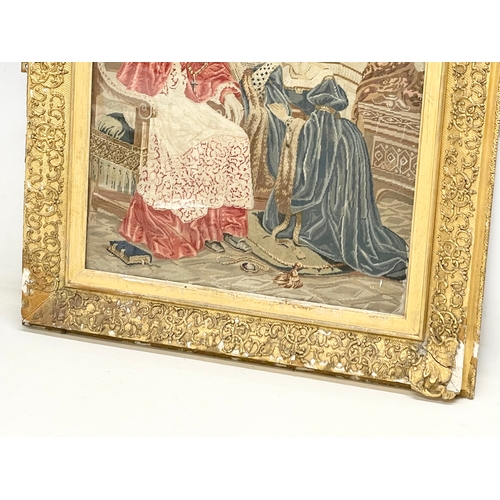 309 - A large 19th century gilt framed religious tapestry. 74x82cm