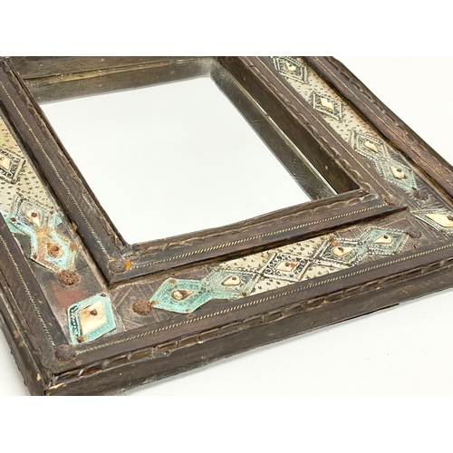 371 - A vintage Islamic style wooden framed mirror. With later back 38x42cm