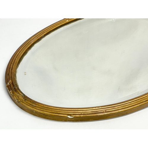 372 - An Edwardian gilt framed mirror. 81x51cm.