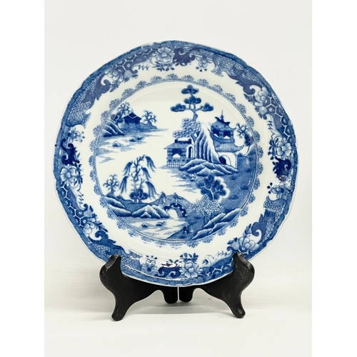 391 - A set of 4 Regency period early 19th century blue and white Chinese design porcelain plates. England... 