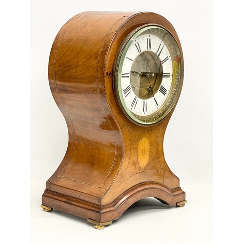 382 - A large Edwardian inlaid mahogany balloon clock. With key and pendulum. 28x19x44cm