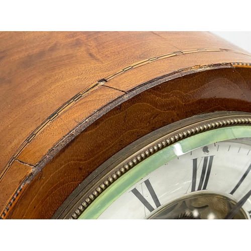 382 - A large Edwardian inlaid mahogany balloon clock. With key and pendulum. 28x19x44cm