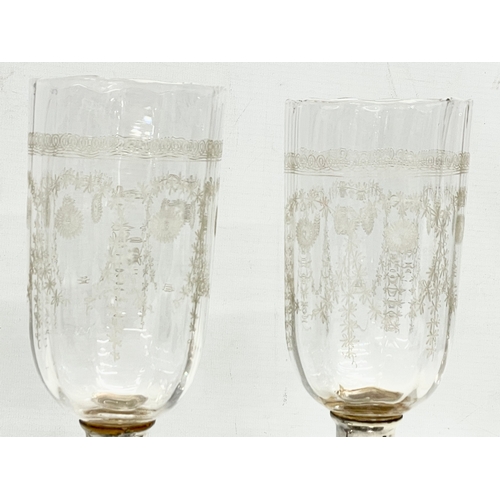 383 - A pair of large Victorian etched glass vases/candleholders with silver plated bases. 25cm