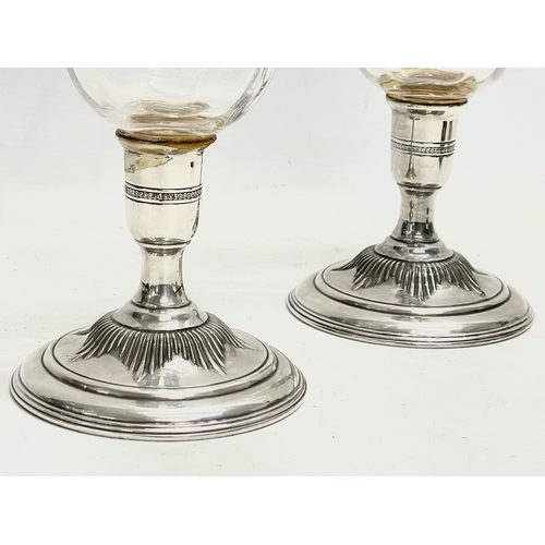 383 - A pair of large Victorian etched glass vases/candleholders with silver plated bases. 25cm