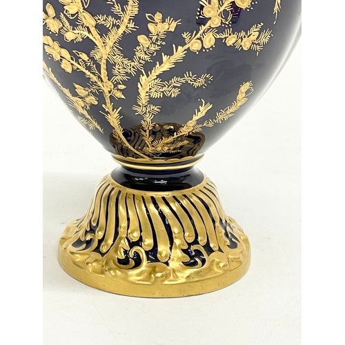 384 - A Royal Crown Derby cobalt blue and gilt porcelain vase. Circa 1891-1940. 18cm