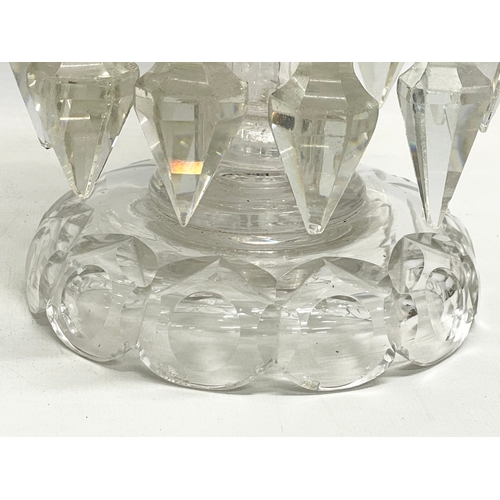 385 - A pair of large Victorian heavy cut glass lustres. 26x30.5cm.