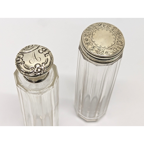 195A - 2 silver topped vanity bottles. 13cm